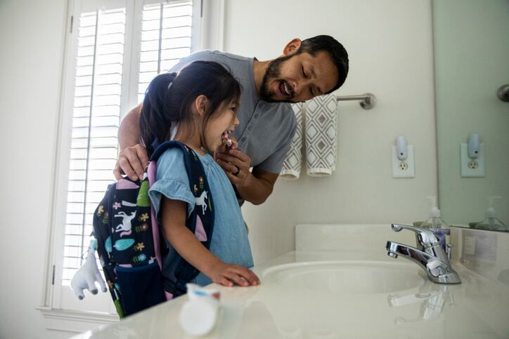 teethbrushing_tooth_toothpaste_daughter_girl_children_father_Family_bathroom_oralcare_oralhygiene_brushing_health_wellbeing.jpg
