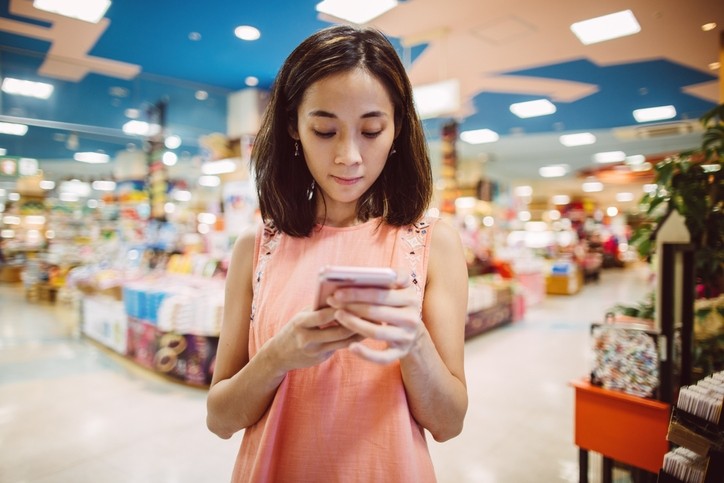 Consumers are in-store but on their phones at the same time, opening up key opportunities for brand-driven experiences and unified commerce [Getty Images]