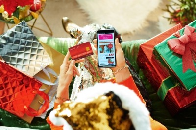 A global survey suggests 87% of consumers plan to shop this Christmas despite more than 40% citing a decrease in household income due to COVID-19 (Getty Images)